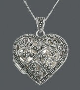 Imagine all the treasures you can keep close to your heart. This keepsake Genevieve & Grace pendant features a filigree setting that shines with the addition of glittering marcasite. Setting and chain crafted in sterling silver. Approximate length: 18 inches. Approximate drop: 1-1/4 inches.