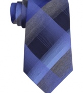 Polished plaid adds sophistication to this Kenneth Cole Reaction statement piece.