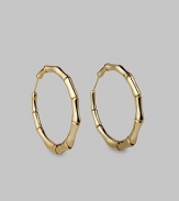 Bold bamboo-textured hoops, exquisitely crafted of gleaming 18k yellow gold. 18k yellow gold Diameter, about 2¼ Pierced Made in Italy