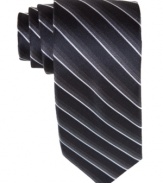 Stripes and a skinny style on this Bar III tie provide the perfect complement to any sleek day-to-night look.