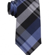 Playful plaid on this Kenneth Cole Reaction tie makes a modern statement against any classic cut.