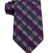 Pave your way to polished style with this grid-patterned silk tie from Calvin Klein.