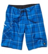 Check it out: a fresh pair of funky shorts from Quiksilver lets you hit the beach in style.