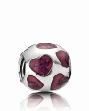 Sterling silver serves as polished backdrop to sweet heart motifs in purple enamel. Charm by PANDORA.