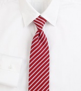 Some things are timeless, and this classic tie, woven in Italian silk with contrast stripes, is one of them. About 3 wideSilkDry cleanMade in Italy