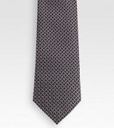 Patterned tie woven in fine Italian silk.About 3.1 wideSilkDry cleanMade in Italy