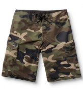 Hide in plain sight. These camo board shorts from Quiksilver give your beach look a jungle twist.