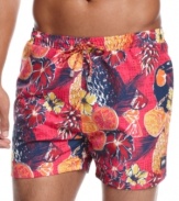 Get paradisaical with these swim trunks from Lacoste that are flush with tropical color.