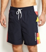 Capture the flag! Get into the fun of playing in the sun with these flag swim trunks from Nautica.