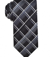 A funky grid pattern gives this silk tie from Alfani a uniquely handsome look.