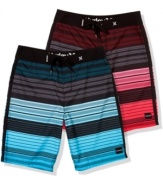 Catch a wave in rad beach style. These swim shorts from Hurley are your summer style staple.