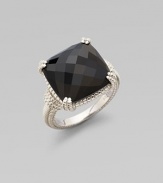 From the Giftables Collection. A sparkling black onyx stone in a four-prong sterling silver setting.Black onyxSterling silverWidth, about ½Imported 