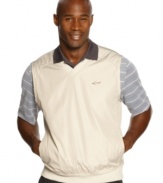 No pressure-you'll be calm and comfortable for every putt in this wind-resistant vest from Greg Norman for Tasso Elba.