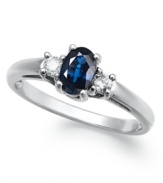 A subtle touch of blue. This vibrant 14k white gold ring features an oval-cut sapphire (1/2 ct. t.w.) and round-cut diamond side stones (1/8 ct. t.w.).