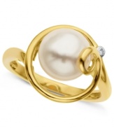 Elegant and appealing. This ring, crafted from 14k gold, features a cultured freshwater pearl (9 mm) with a diamond accent for subtle, yet stylish, touch. Approximate diameter: 3/4 inch.