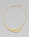 Two simple, elegant strands overlap one another in this golden design with a modern edge.18k goldplatedLength, about 16 with 3 extenderLobster claspMade in USA