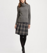 Inspired by the classic kilt, a fascinating virgin-wool blend skirt with bold buckle details.Buckle details at waistbandKnife-pleat detailsFully linedAbout 22 long80% virgin wool/20% nylonDry cleanImportedModel shown is 5'11 (180cm) wearing US size 4. 