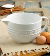 Mix and pour the perfect pancakes, waffles and crepes with Le Creuset's beautiful batter bowl. Crafted using traditional techniques, this stoneware bowl is fired at ultra-hot temperatures giving it unrivaled strength and durability, while its timeless design lends a distinctive charm to everyday kitchen tasks. Limited lifetime warranty.