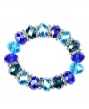 Drink in the cool blues! Captivating with tonal blue plastic beads, Nine West's stretch bracelet also boasts silver tone rondelles with clear crystal accents. Bracelet stretches to fit wrist. Crafted in imitation rhodium-plated mixed metal. Approximate diameter: 2 inches.