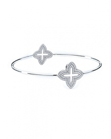 The clover-shaped stations on this delicate bangle from Crislu strike a distinctive balance between classic iconography and contemporary sparkle.