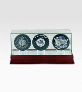 Perfect for the tried-and-true Rangers fan! This three puck set includes All-Star Goalie Henrik Lundqvist, 2012 All-Star Game MVP Marian Gaborik, and Team Captain Ryan Callahan and comes displayed in a sleek glass and wood case.Steiner Sports Certificate of Authenticity includedHand signed by the players listedWood and glass caseKeep out of sunlight16W X 10H X 11DMade in USA