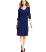 Look your best in this sexy petite B-Slim dress by Elementz. It's got a flattering shape with a built-in slimming lining for a smooth silhouette.