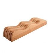 Come into counter space with the innovative genius of an in-drawer knife block. Made from 100% bamboo, this attractive accent provides the solid and durable space to store your sharpest knives. The curved design positions knives at two levels for easy access and removal.