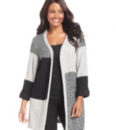 Cozy up to the chic comfort of Debbie Morgan's colorblocked plus size cardigan-- it's a staple for the season!