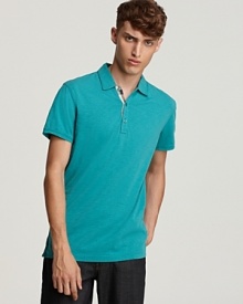 A lightweight cotton slub makes this Burberry polo an ideal option for days when comfort and style are equally important.