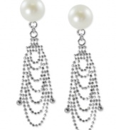 A lace look lends a stylish touch to these drop earrings. Crafted from sterling silver with a rhodium finish, the pair evokes elegance with cultured freshwater pearls (8-8-1/2 mm). Approximate drop length: 1-1/2 inches. Approximate drop width: 3/8 inch.