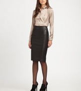 A timeless skirt silhouette made from Italian lambskin with a hint of stretch for a fantastic fit.Waist dartsBack zipperBack ventFully linedAbout 25 longLambskin leatherDry clean by leather specialistImported Model shown is 5'9½ (176cm) wearing US size 4. 