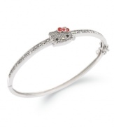 Sleek and stylish. Hello Kitty's sterling silver bangle is adorned with pave crystals and features a sparkling center for an added touch. Approximate diameter: 2-1/2 inches. Approximate size, Hello Kitty face: 1/2 inch.