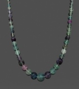 Add color to liven your look. Necklace features purple and green graduated, fluorite beads (6-16 mm) and a 14k gold clasp. Approximate length: 18 inches.