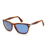 Persol takes inspiration from a jetsetter's paradise--the gorgeous Italian island of Capri. Part of a uniquely handcrafted, luxurious collection, this brown frame's distinctive temple design is inspired by the unique architecture of Capri's Casa Malaparte. Every shape and detail has been translated into this special edition style. Lenses are crystal blue.