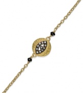 Wrist watching. This bracelet, crafted from 14k gold over sterling silver and oxidized sterling silver, features an evil eye charm at the center with round-cut cubic zirconia accents providing a lustrous touch. Approximate length: 7-1/2 inches. Approximate charm size: 1/2 inch.