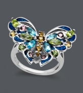 A ring that will flit its way into your heart and your every day wardrobe. Town & Country's intricate butterfly features a sterling silver setting decorated by citrine (1/3 ct. t.w.), pink tourmaline (1/5 ct. t.w.), blue topaz (1/3 ct. t.w.) and peridot (1 ct. t.w.). Size 7.