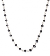 An elegant combination. Faceted black diamond beads (7 ct. t.w.) enhance the appeal of this link necklace, set in 14k gold. Approximate length: 17 inches.