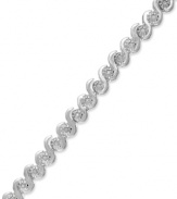 Embrace your elegant side. Victoria Townsend's bracelet, set in sterling silver, offers a radiant look with round-cut diamonds (1/4 ct. t.w.) only enhancing the luster. Approximate length: 7 inches.