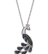 When it comes to your personal style, stand proud. This pendant, set in sterling silver, is radiant with blue and green diamond accents (1/10 ct. t.w.) capturing the look of one of nature's most beautiful creatures. Approximate length: 18 inches. Approximate drop: 1 inch.