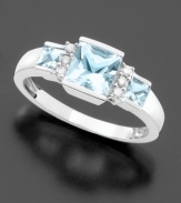 Subtle yet dramatic pastel-blue aquamarine (9/10 ct. t.w.) is complemented by diamond accents in this stunning ring design. Set in 14k white gold.