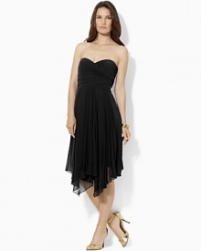 Sharp pleats, an asymmetrical hem and a romantic sweetheart neckline imbue a graceful georgette cocktail dress with modern glamour. Soft pleats give beautiful movement to the asymmetrical skirt.