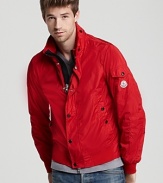 Trim and sporty, this handsome jacket protects your from the elements and introduces a bold pop of color into your cold-weather wardrobe.