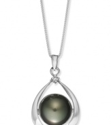 Good luck and a touch of polish. This sophisticated horseshoe-shaped pendant features a cultured Tahitian pearl (11-13 mm) and a sparkling diamond accent. Set in sterling silver. Approximate length: 18 inches. Approximate drop: 1 inch.