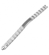 Stylish and sophisticated, this unique men's bracelet is crafted in stainless steel and titanium with ion plating. It features a unique center station with rhinoceros skin texture. Bracelet features an extra extension link that can be removed or added to the end of the bracelet. Approximate length: 8-1/2 inches + 1/2-inch extender.