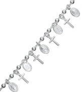 Crossover appeal. This bracelet from Giani Bernini is crafted from sterling silver with special cross and circular charms making for a stylish statement. Approximate length: 7-1/2 inches.