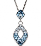 You can't beat these blues. EFFY Collection's beautiful mosaic pendant features shades of round and oval-cut blue topaz (11-5/8 ct. t.w.) set in sterling silver. Approximate length: 18 inches. Approximate drop: 2-3/4 inches.