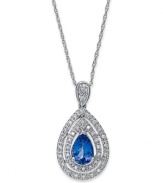 The center of attraction. This 14k white gold necklace evokes elegance with a tanzanite (5/8 ct. t.w.) and diamond (1/10 ct. t.w.) pendant adding luster. Approximate length: 18 inches. Approximate drop: 1/2 inch.