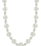 Cultured freshwater pearls (8-8-1/2 mm) blend with rhodium-plated sparkle beads on this sterling silver necklace as the classic look gets a contemporary touch. Approximate length: 18 inches.