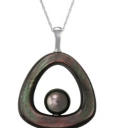 Center of attraction. This sterling silver necklace adds a sophisticated touch with a mother of pearl pendant enveloping a Tahitian pearl (11-12 mm) for an effect that's quite stunning. Approximate length: 18 inches. Approximate drop length: 1-3/4 inches.