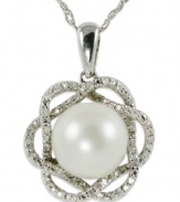 Elegance is always in season, just like this sterling silver necklace which features a cultured freshwater pearl (9-10 mm) and round-cut diamond (1/10 ct. t.w.) flower pendant. Approximate length: 18 inches. Approximate drop length: 7/8 inch. Approximate drop width: 5/8 inch.